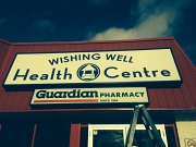 Wishing Well Pharmacy logo